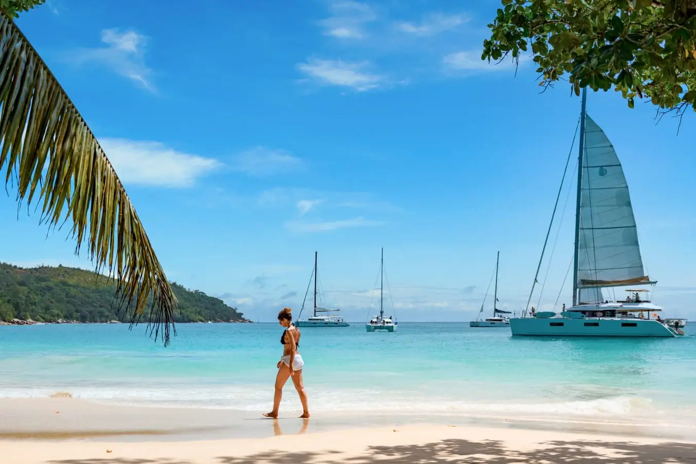 women-walking-on-beach